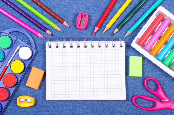 School and office supplies on jeans background, back to school concept, copy space for text - 写真・画像