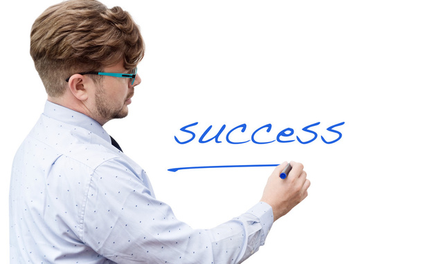Jonge zakenman schrijven word succes op markerboard - Foto, afbeelding