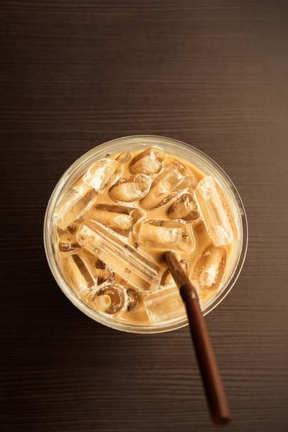 Top view iced coffee on wooden table - Foto, Imagem