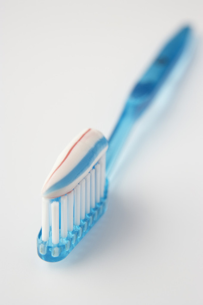 Toothbrush loaded with toothpaste - Foto, Imagen