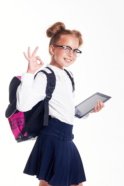 Portrait of young girl with tablet - 写真・画像