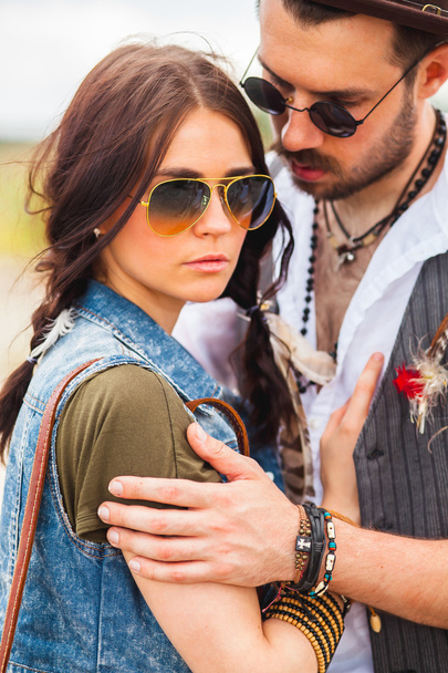 Man and woman as boho hipsters against blue sky - Foto, Imagen