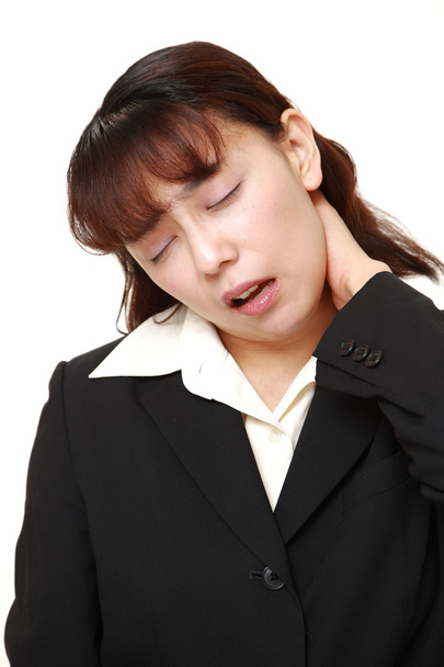 Asian businesswoman suffers from neck ache - Foto, Imagem