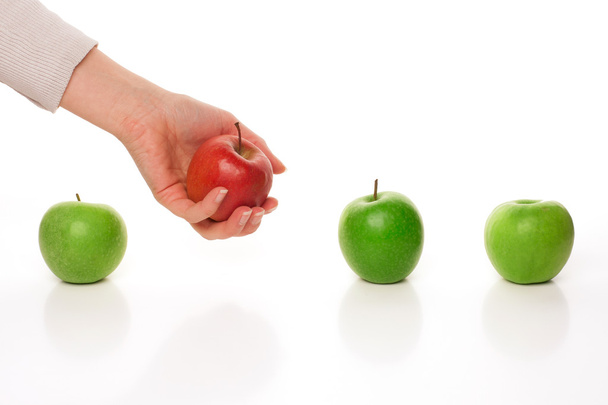 Recogiendo diferentes manzanas
 - Foto, imagen