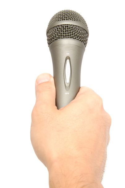 Hand Holding a Microphone - 写真・画像