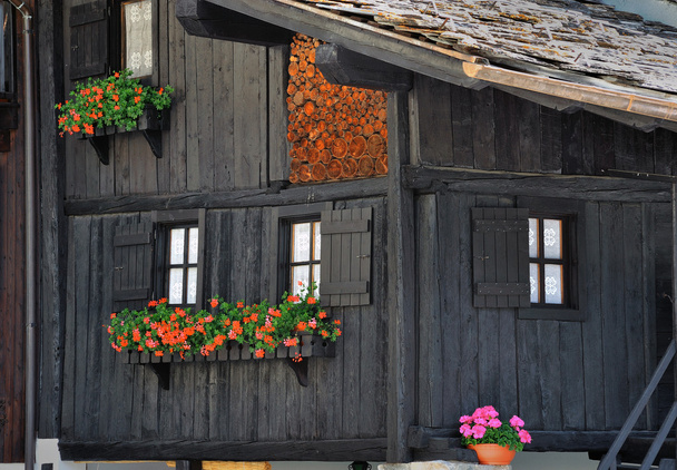typical wood houses facade in alps town in Valle dAosta, Italy - Photo, Image