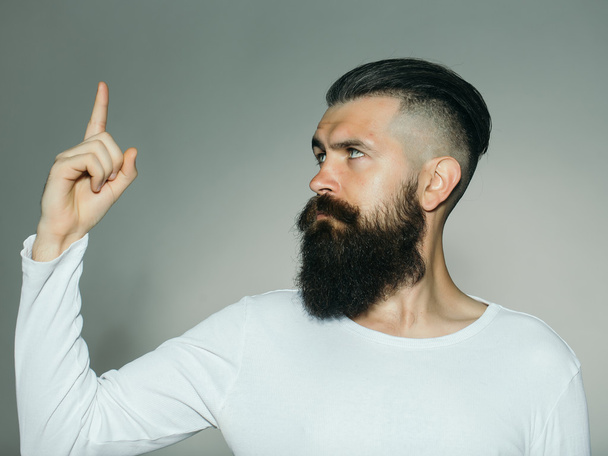 Bearded man with gesture - 写真・画像