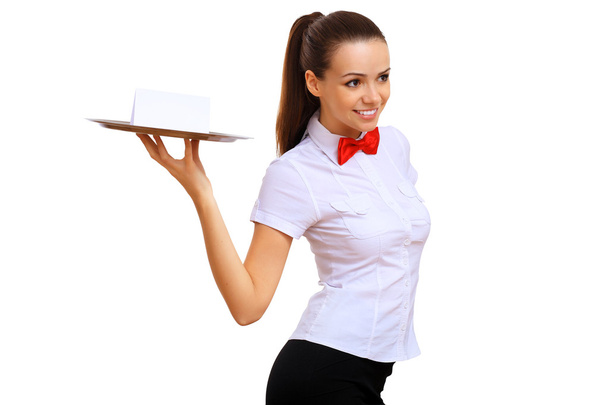 Young waitress with an empty tray - Foto, afbeelding