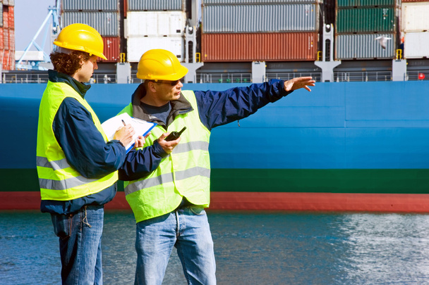 Dockers en el trabajo
 - Foto, Imagen