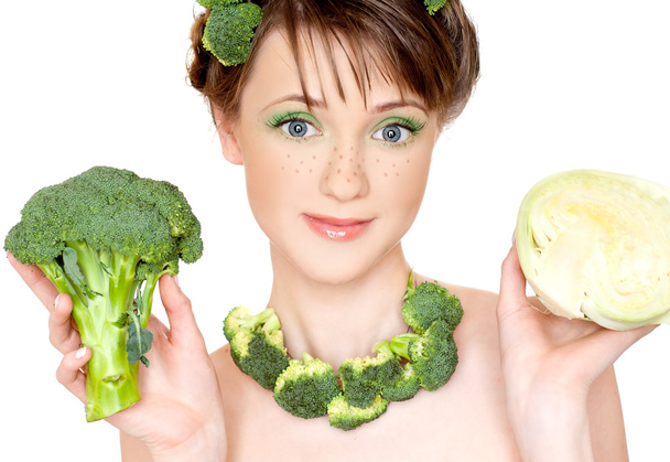 Young woman with vegetables  - 写真・画像