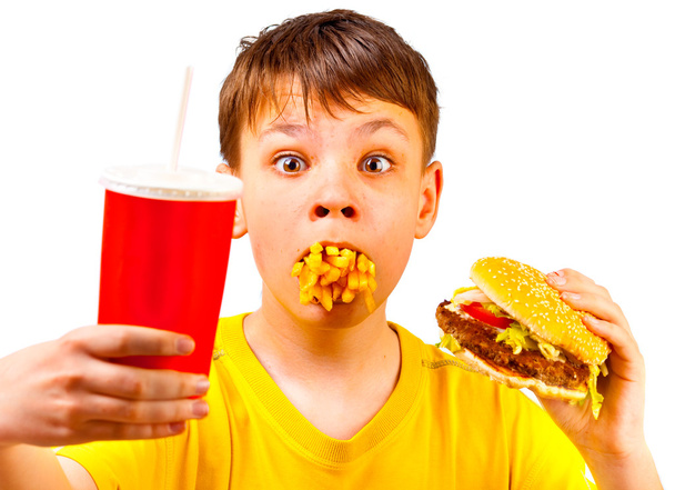Child and fast food - Фото, изображение