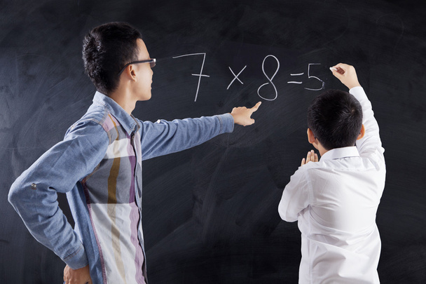 Man teaching math on the boy - 写真・画像