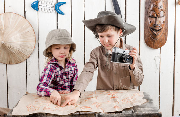 two little children watching map - Photo, image