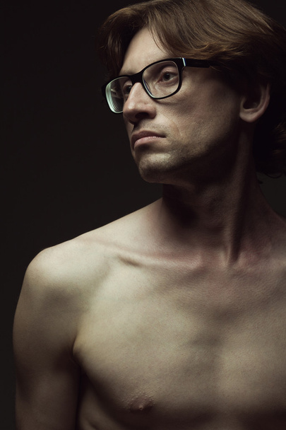 Real natural male beauty concept. Close up profile portrait of man in eyewear - Foto, Imagen