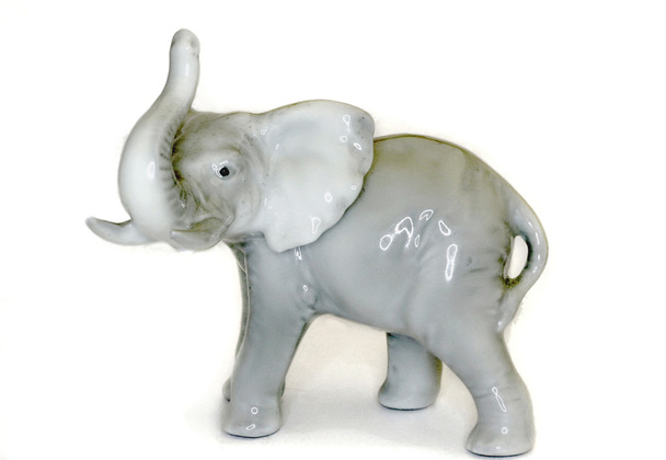 Фигура серого слона на белом фоне
 - Фото, изображение