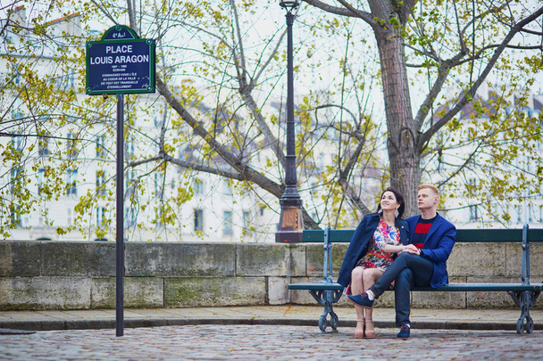 Romantic couple in Paris near the Seine - Photo, Image