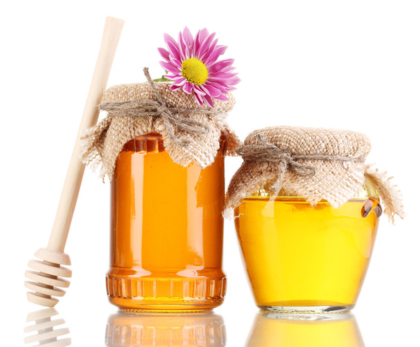 Sweet honey in jars with drizzler isolated on white - Valokuva, kuva