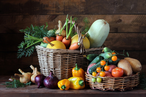 Vegetables in the basket. Still life in rustic style. - Foto, imagen