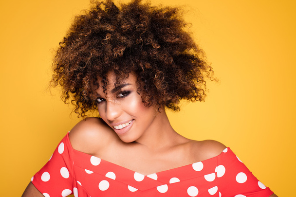Beauty portrait of smiling girl with afro. - Фото, зображення