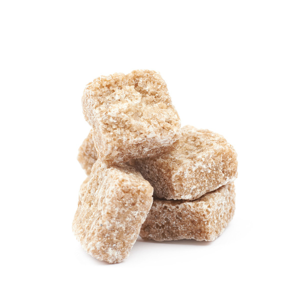 Pile of brown sugar cubes isolated - Фото, зображення