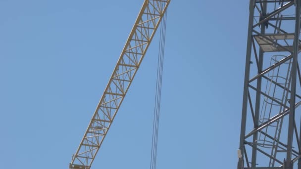 Crane on blue sky background. - Footage, Video