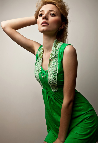 Young sensual girl in fashion clothes pose in studio. - Zdjęcie, obraz