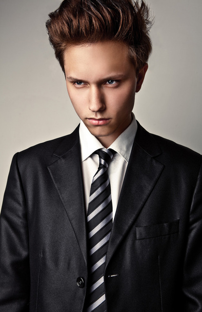 Handsome young man studio portrait. - Foto, Bild