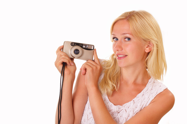 Pretty young woman with an old camera - Foto, immagini