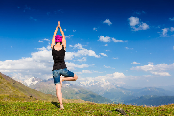 woman doing a yoga pose - Photo, Image