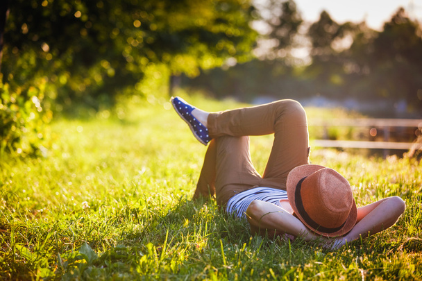 Girl Relaxing on the Grass - Photo, image