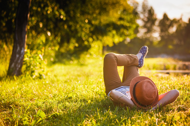 Girl Relaxing on the Grass - Fotografie, Obrázek