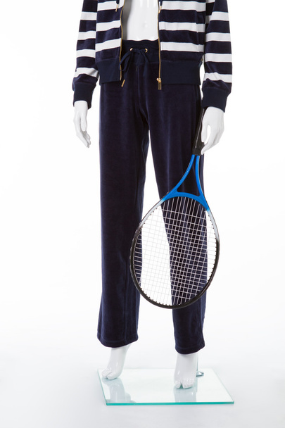 White mannequin with tennis racquet. - Zdjęcie, obraz