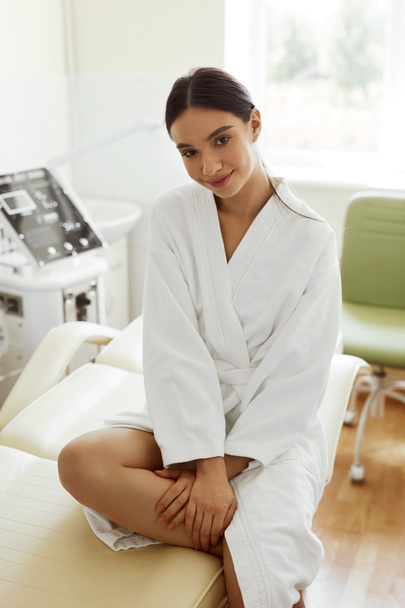 Beautiful Woman In Bathrobe In Cosmetology Room At Spa Salon - Photo, Image