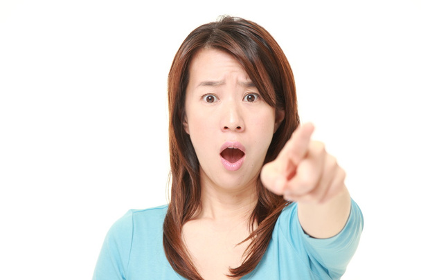 middle aged Japanese woman shocked  - 写真・画像