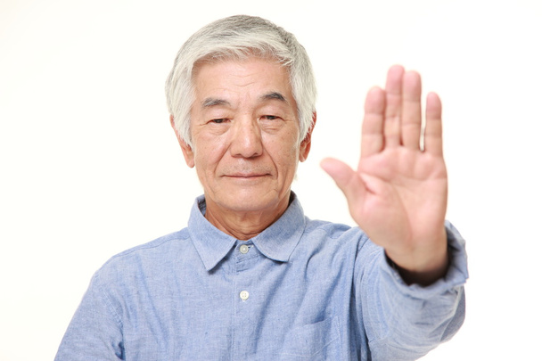 senior Japanese man making stop gesture - Фото, изображение