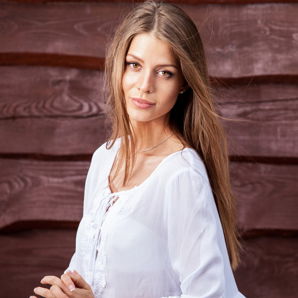 Young sensual & beauty blonde woman pose on wooden background - Foto, immagini