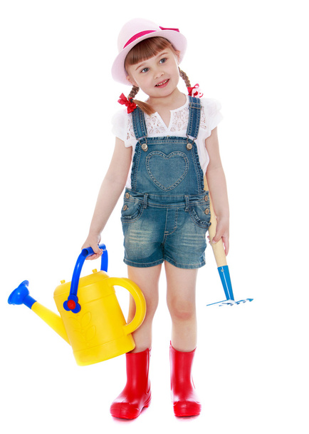 Girl with watering can - Foto, Imagen
