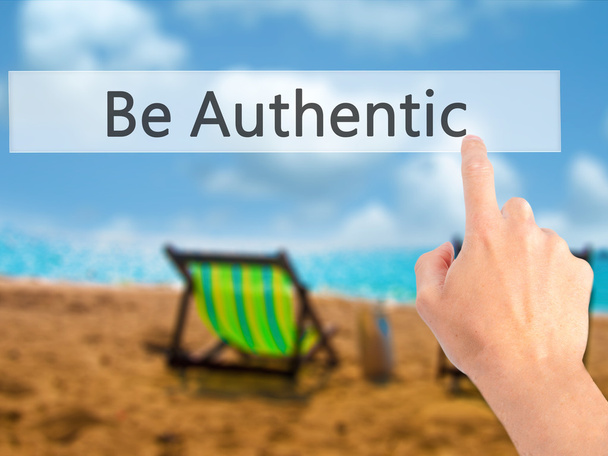 Be Authentic - Hand pressing a button on blurred background conc - Photo, Image