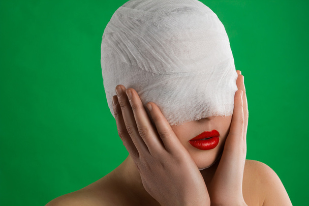 The patient withe a bandage - 写真・画像