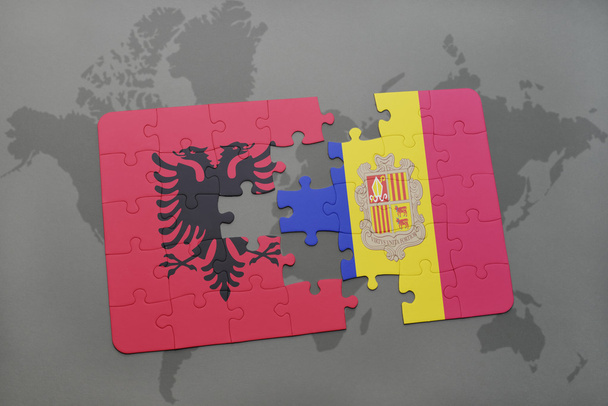 rompecabezas con la bandera nacional de albania y andorra en un mapa del mundo fondo
. - Foto, imagen