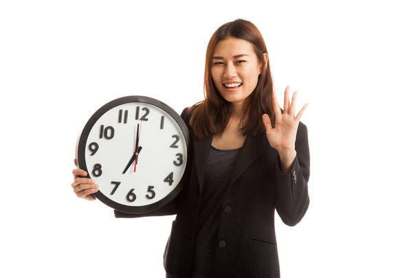 Χαρούμενος νεαρός Ασιατικός επιχειρησιακός γυναίκα με ένα ρολόι. - Φωτογραφία, εικόνα