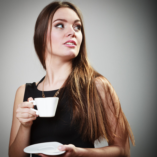 Cheerful woman drinking coffee - Foto, imagen