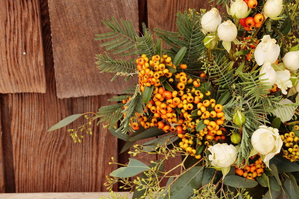 Holiday flower bouquet inside a gourd vase  - Photo, Image