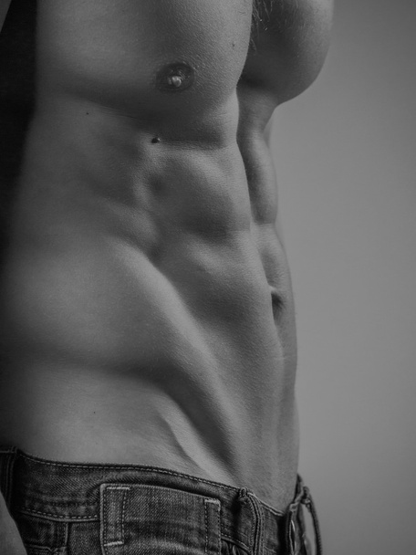Perfectly fit shirtless young man - Photo, Image