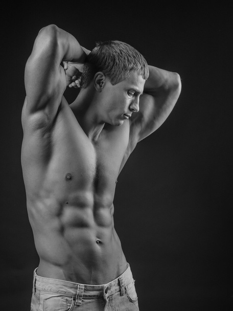 Perfectly fit shirtless young man - Φωτογραφία, εικόνα