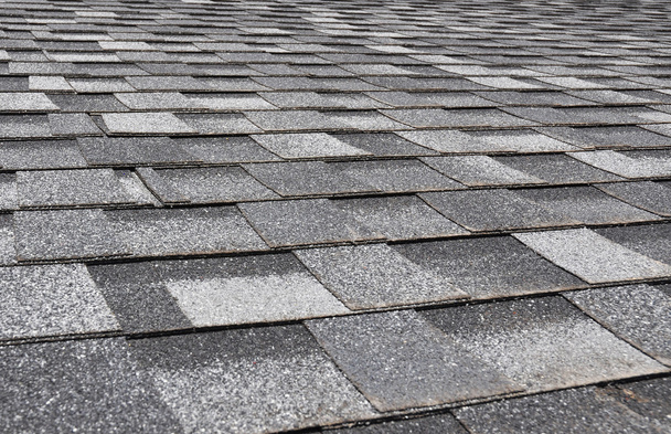 Close up view on Asphalt Roofing Shingles Background. Roof Shingles - Roofing. - Photo, Image