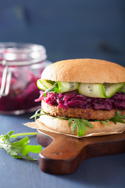 veggie soy burger with pickled red cabbage cucumber arugula - Фото, изображение