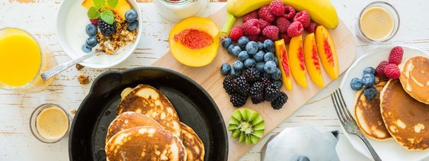 Breakfast with fresh fruits and berries - Фото, изображение