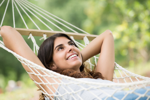 Happy Woman Relaxing In Hammock - Фото, изображение