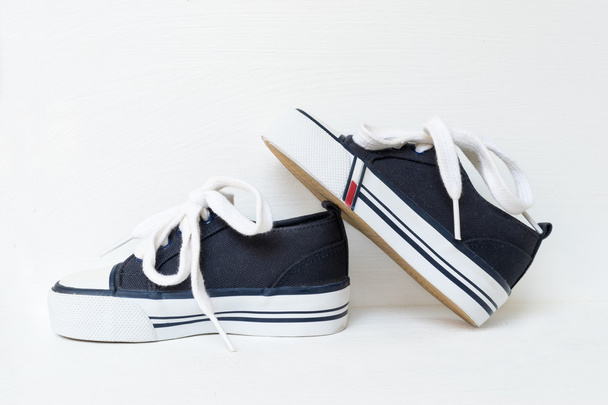 White-blue children's high top sneakers - Photo, Image
